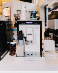 Refurbished DeLonghi Eletta Cappuccino In White ECAM44660W -Coffee Machine Shop delonghi social lifestyle eletta white coffee n clothes event all rights jan 2099